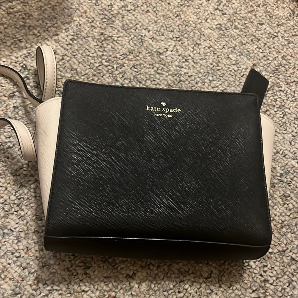 cleaning out my closet, would love from my purse to go to a New Home.